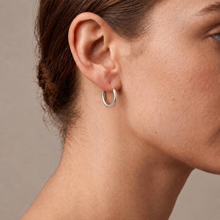 Fine Line Silver Hoops - PRIVA Fashion model photo